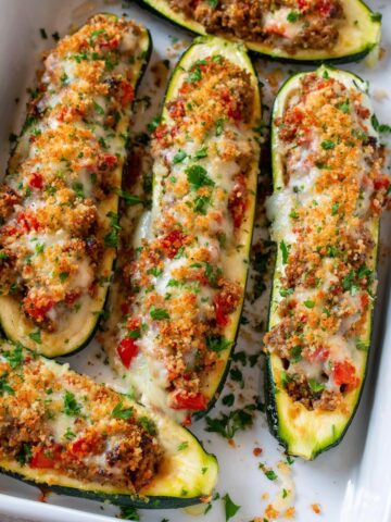 Stuffed Zucchini Boats with Italian Sausage, Tomato, and Cheese Recipe