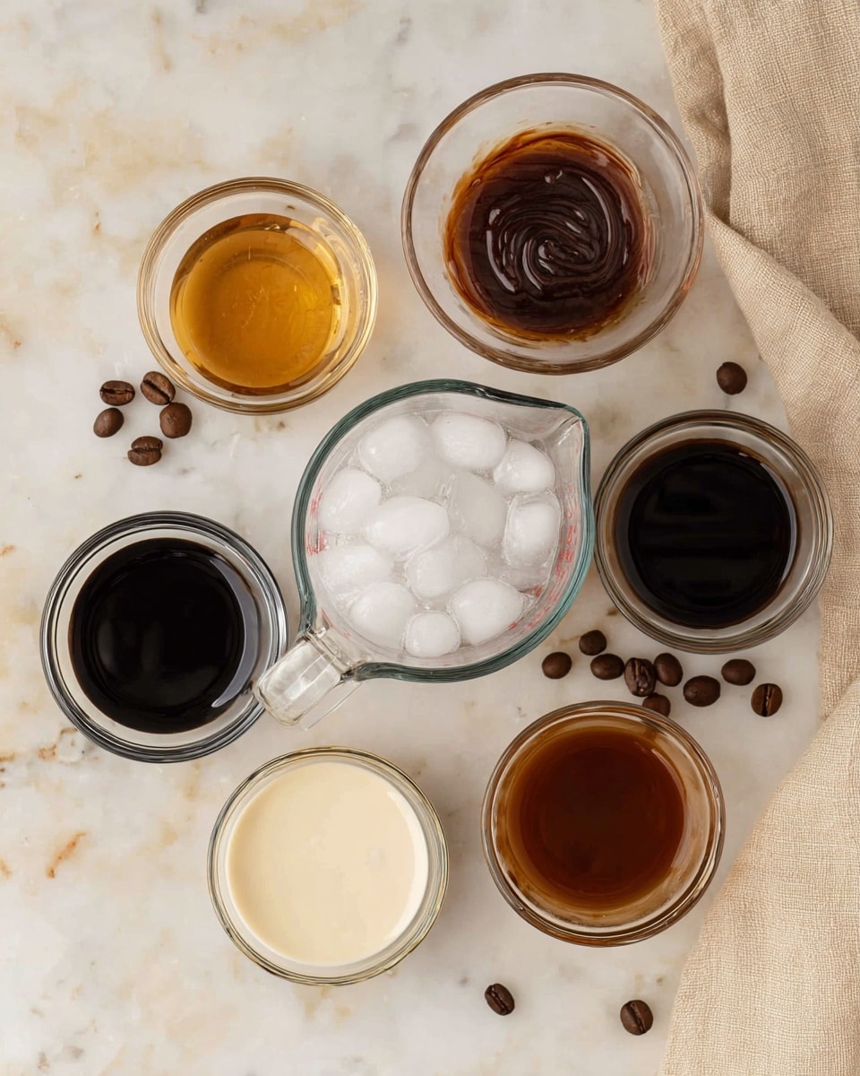 The image shows six clear glass containers arranged on a white marbled surface with few scattered coffee beans. In the center is a glass measuring cup filled with white round ice cubes, slightly translucent with smooth surfaces. Surrounding it are five small glass bowls with different colored liquids: top left is a light brown golden liquid with a slightly thick texture, top right a glossy dark brown sauce with a swirl pattern, bottom left a dark and rich black liquid, bottom right a creamy off-white liquid with a smooth surface, and at bottom center a medium brown liquid with a translucent look. A beige cloth is partially visible at the top right corner. photo taken with an iphone --ar 4:5 --v 7