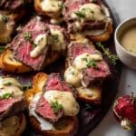 Beef Tenderloin Crostini with Parmesan Wine Cream Sauce Recipe