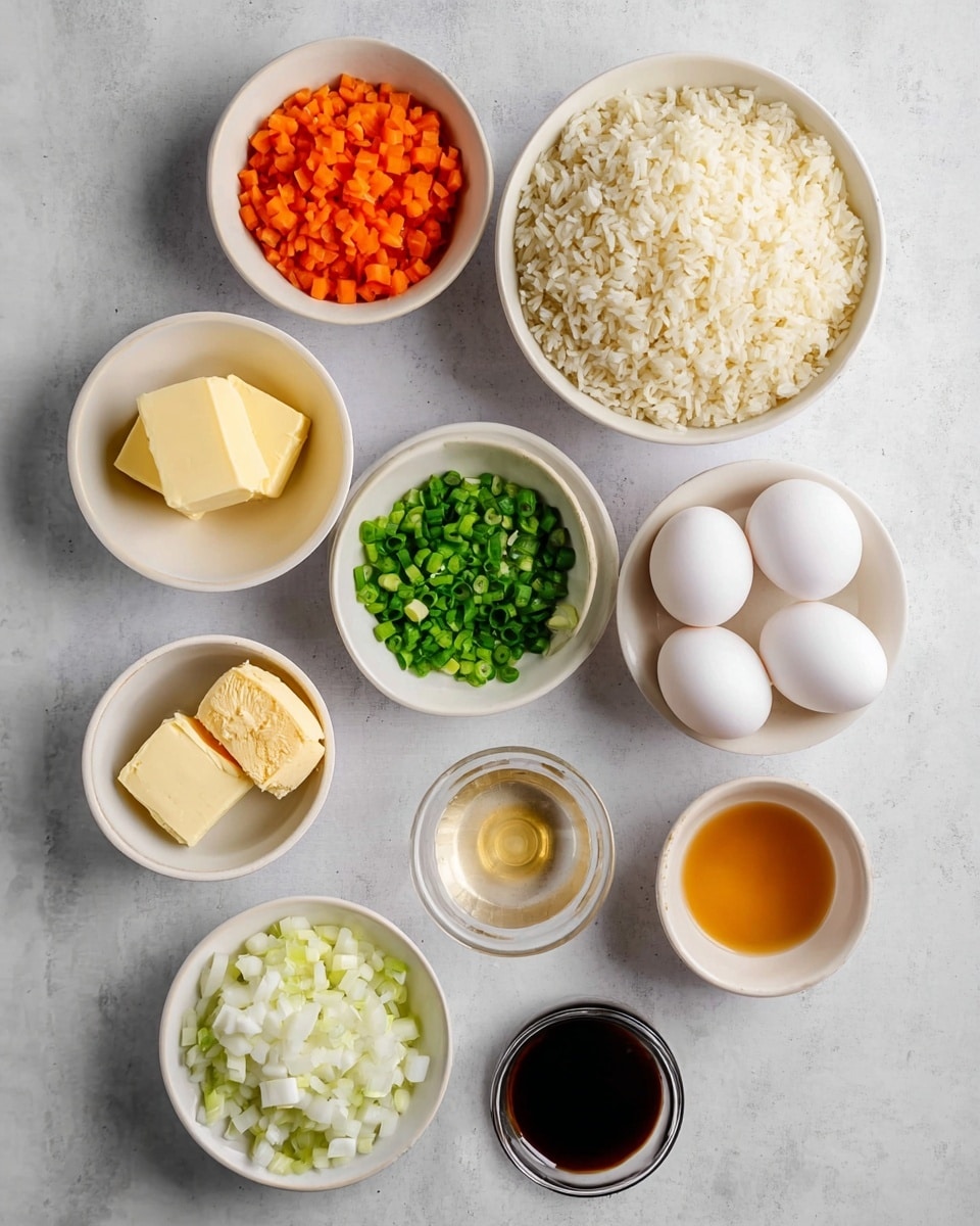 A top view of nine white bowls arranged on a light white marbled surface, each holding different ingredients: one bowl is full of cooked white rice with light fluffiness; another has bright orange carrot pieces chopped small; a third bowl contains vivid green chopped spring onions; a small bowl holds two yellow blocks of butter; another small bowl has a mix of pale yellow and light brown pastes placed side by side; one bowl is filled with white chopped onions with a fresh crisp look; a bowl with two whole white eggs sits near the right side; a small bowl contains a dark brown liquid, and another small glass bowl shows a light amber liquid. The bowls are spaced evenly in a neat, organized way photo taken with an iphone --ar 4:5 --v 7