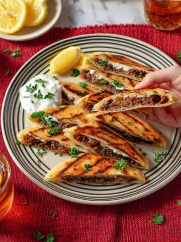 Middle Eastern Meat-Stuffed Pita (Arayes) with Tzatziki and Fresh Herbs Recipe