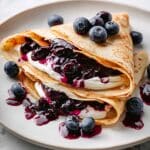 Blueberry Crepes with Lemon-Infused Blueberry Filling and Honey Whipped Cream Recipe