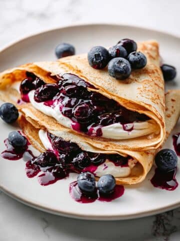 Blueberry Crepes with Lemon-Infused Blueberry Filling and Honey Whipped Cream Recipe