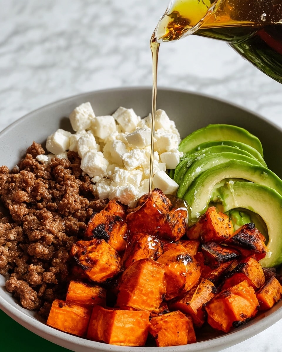 A white bowl on a white marbled surface holds four distinct layers: in the bottom left is a layer of browned ground meat with a coarse texture, beside it on the bottom right are bright orange roasted sweet potato cubes with visible charred edges, to the top right are thick slices of green avocado with a smooth texture, and in the top left is a mound of small white cottage cheese curds. A golden liquid honey is being poured over the bowl, creating a shiny drizzle mostly over the cottage cheese and sweet potatoes. Photo taken with an iphone --ar 4:5 --v 7
