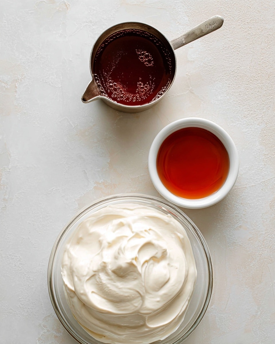 The image shows three small containers on a white marbled surface. At the bottom, there is a clear glass bowl filled with a thick, creamy white mixture that looks smooth and soft like whipped cream. On the right side, a small white bowl holds a reddish-brown liquid with a thin texture. Above that, a silver measuring cup with a handle shows a dark reddish syrup that looks a bit thick with a few small bubbles on the surface. photo taken with an iphone --ar 4:5 --v 7