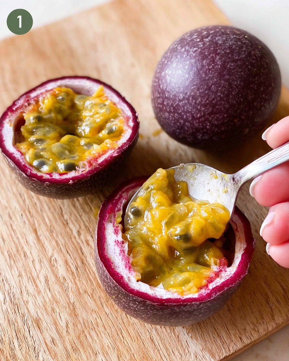 The image shows two whole purple passion fruits and one purple passion fruit cut in half with bright yellow-orange pulp filled with small black seeds inside. A woman's hand holds a spoon scooping out some of the juicy pulp from one half. The fruits are placed on a light wooden board with a natural wood grain texture. The focus is on the texture and color contrast between the dark purple rind and the vibrant yellow inside. photo taken with an iphone --ar 4:5 --v 7