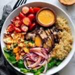 Steak Bowl Recipe with Tender Steak, Quinoa, Tomatoes, Onions, and Hot Honey Sauce Recipe